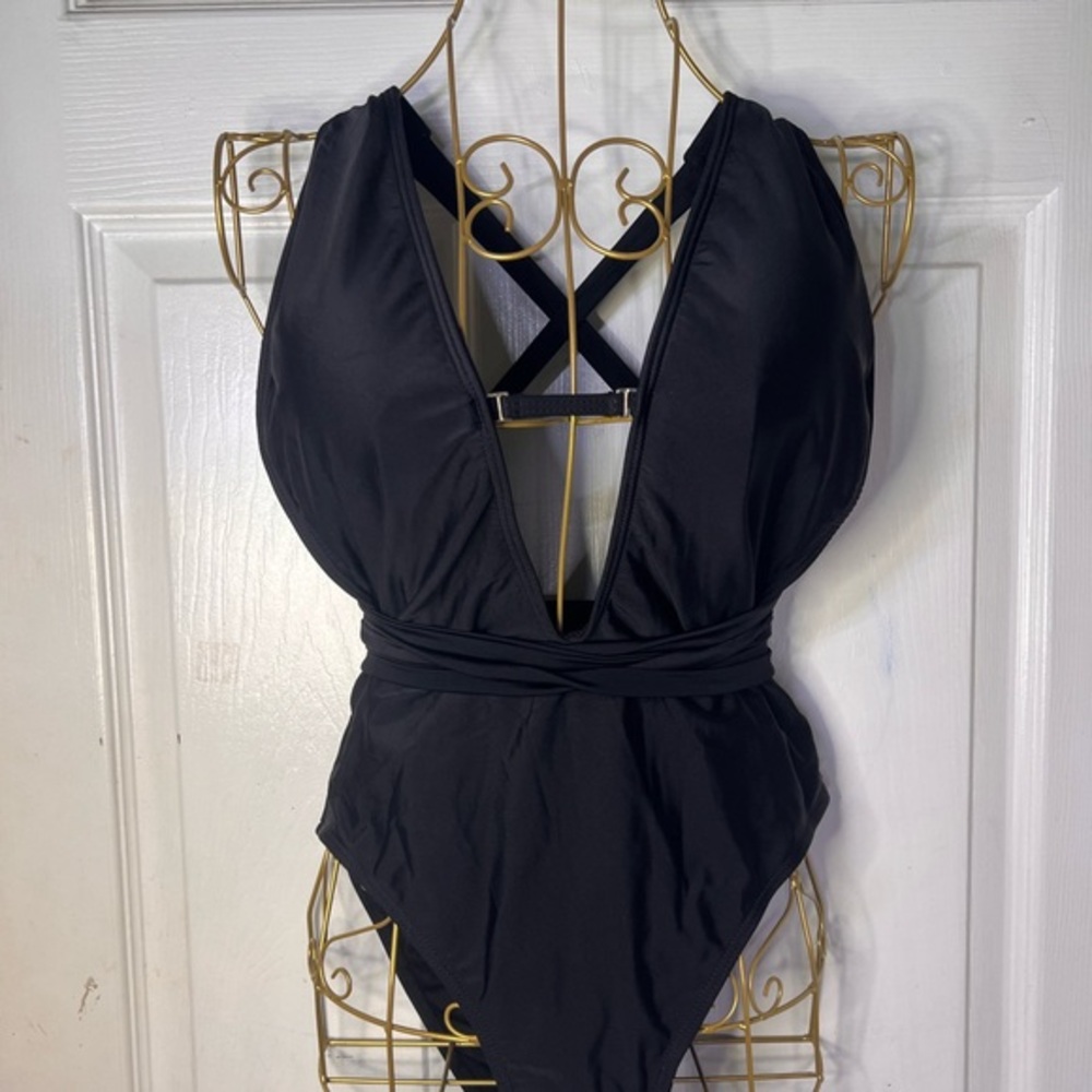 Sexy sleek black cut out one piece swimsuit with cut outs